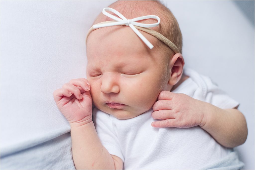 newborn girl white bow