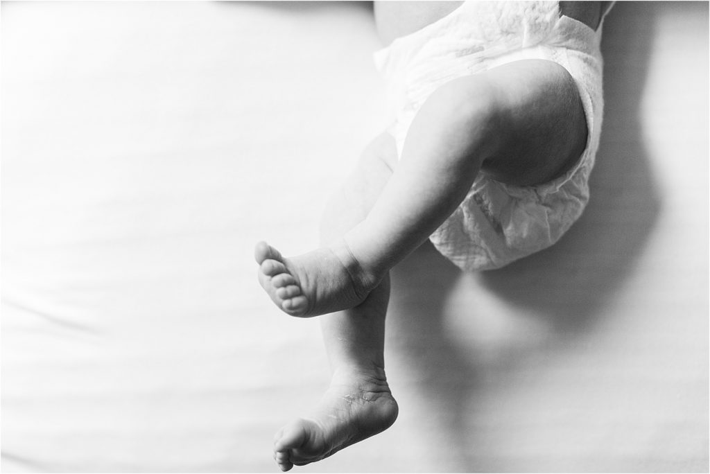 newborn girl feet and legs