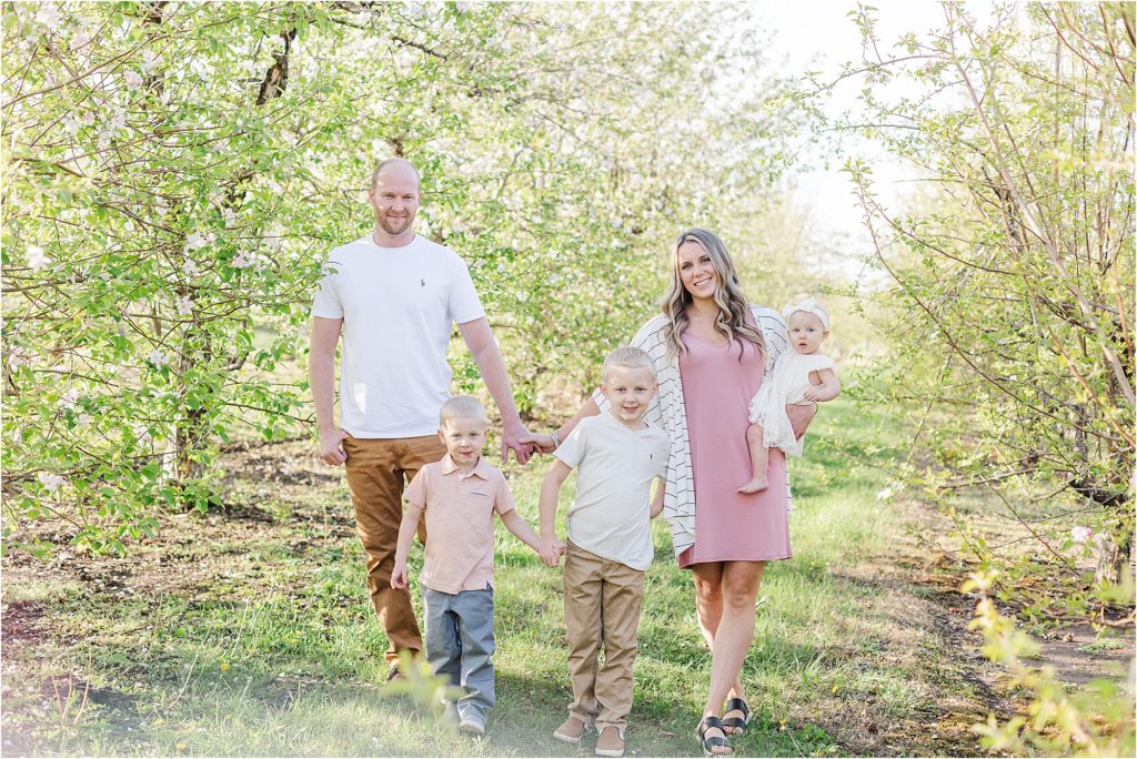 Fisher family | Cider Hill Family Orchard apple blossom spring photos | Kelsey Alumbaugh Photography | #appleblossomsession #springmotherhoodphotos #motherhoodphotos #appleblossoms #kcappleblossom #springfamilyphotos