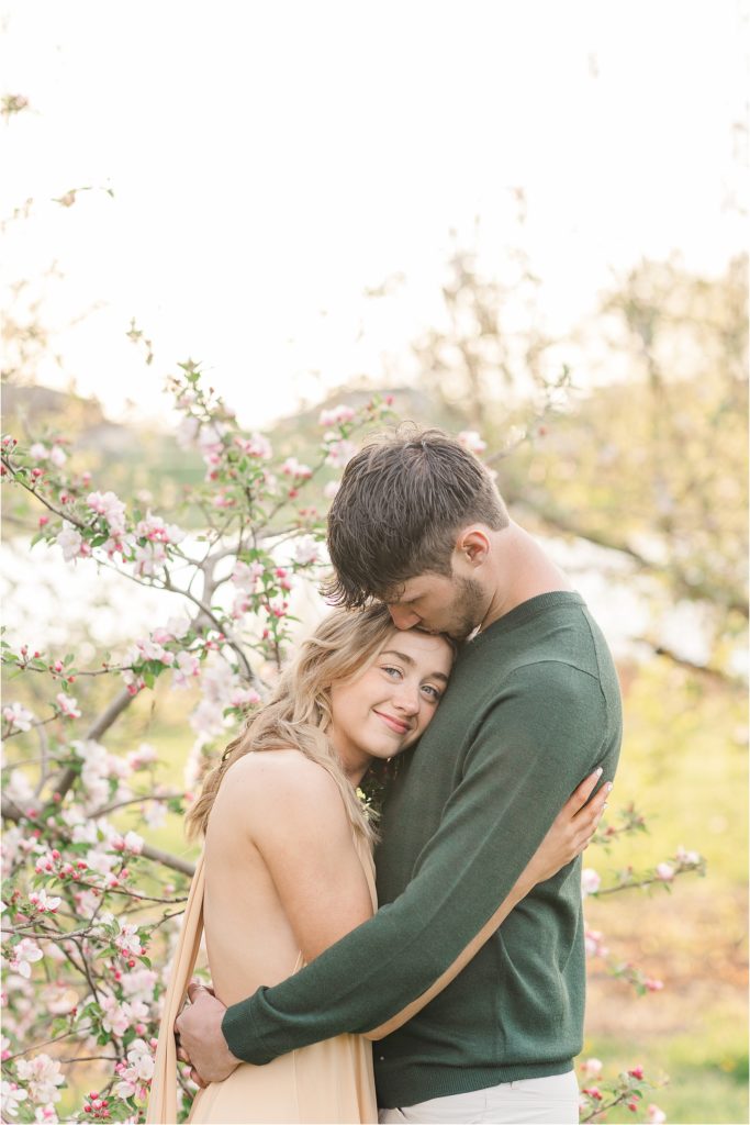 Sydney + Dawson | Cider Hill Family Orchard apple blossom couples photos | Kelsey Alumbaugh Photography | #appleblossomsession #springcouplesphotos #engagementphotos #appleblossoms #kcappleblossom