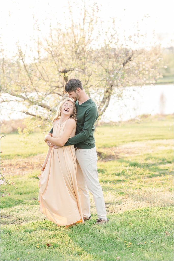 Sydney + Dawson | Cider Hill Family Orchard apple blossom couples photos | Kelsey Alumbaugh Photography | #appleblossomsession #springcouplesphotos #engagementphotos #appleblossoms #kcappleblossom