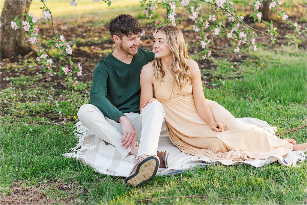 Sydney + Dawson | Cider Hill Family Orchard apple blossom couples photos | Kelsey Alumbaugh Photography | #appleblossomsession #springcouplesphotos #engagementphotos #appleblossoms #kcappleblossom