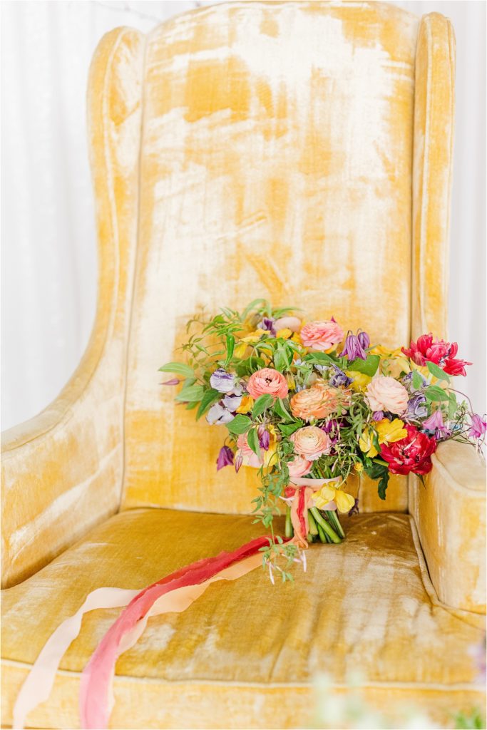 yellow velvet chair bright colorful bridal bouquet Micro Wedding Inspiration at Emerson Fields | Kelsey Alumbaugh Photography | #microwedding #emersonfields #microweddingkc #kcwedding #kcweddingphotographer
