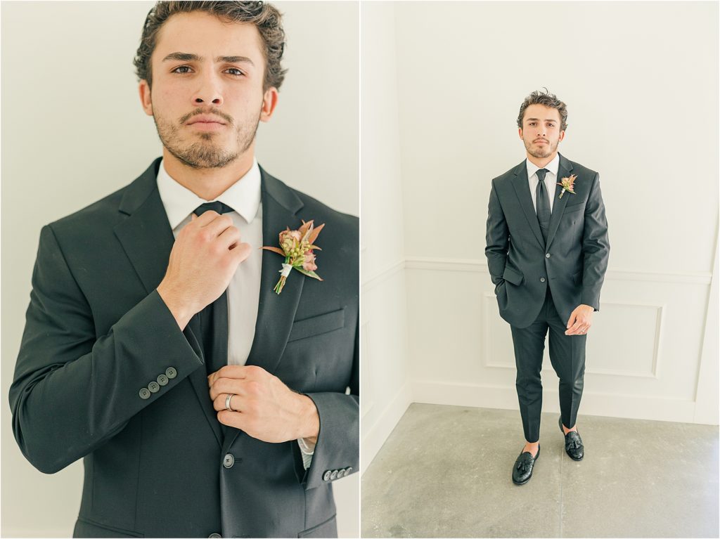 Groom adjusting tie in black tux. Groom with loafers walking forward Groom in black tux holding blush bridal bouquet holding hands with bride in white off the shoulder wedding gown to walk down aisle Westwind Hills luxury wedding inspiration | Kelsey Alumbaugh Photography | #weddinginspiration #luxurywedding #stlouisweddingphotography #stlwedding #styledshootsacrossamerica