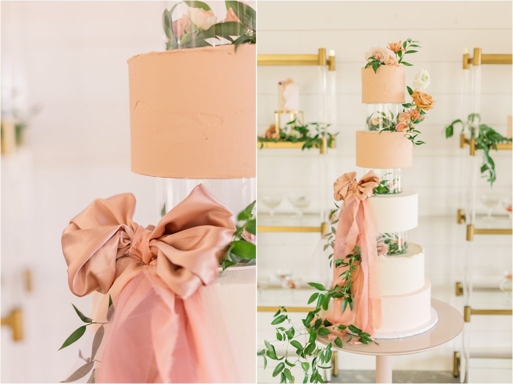 blush and white tiered wedding cake with satin ribbon with gold shelves of wedding desserts Westwind Hills luxury wedding inspiration | Kelsey Alumbaugh Photography | #weddinginspiration #luxurywedding #stlouisweddingphotography #stlwedding #styledshootsacrossamerica