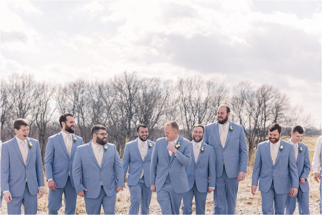 Groom with groomsmen in cornflower blue suits at Eagle Bluff Ranch, Waverly, Mo - Haylee + Blake | Missouri River spring wedding | Kansas City wedding photographer | Kelsey Alumbaugh Photogrpahy | #kansascitywedding #missouriweddingphotographer #missourispringwedding