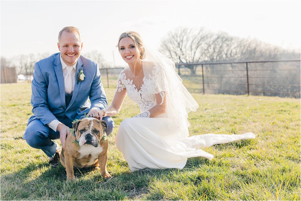 Bride and groom portraits with their dog with groom in cornflower blue suits at Eagle Bluff Ranch, Waverly, Mo - Haylee + Blake | Missouri River spring wedding | Kansas City wedding photographer | Kelsey Alumbaugh Photogrpahy | #kansascitywedding #missouriweddingphotographer #missourispringwedding