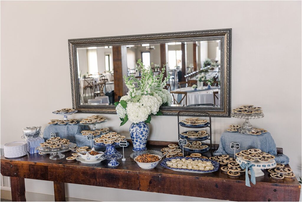 Blue, white and taupe reception with blue willow vases and tiny homemade pies at Eagle Bluff Ranch, Waverly, Mo - Haylee + Blake | Missouri River spring wedding | Kansas City wedding photographer | Kelsey Alumbaugh Photogrpahy | #kansascitywedding #missouriweddingphotographer #missourispringwedding